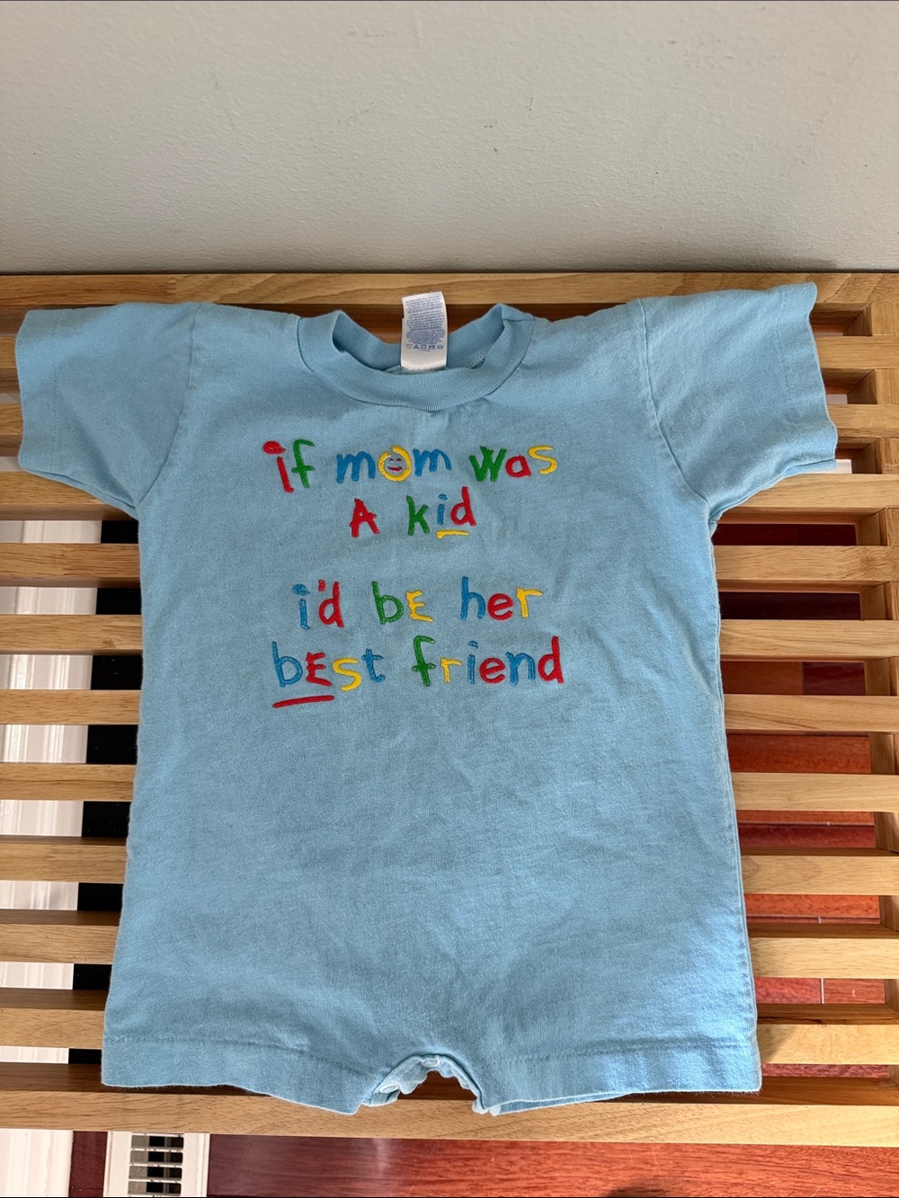 Rabbit Skins Light Blue Short Sleeve Kids Romper Tee with Multicolor Text